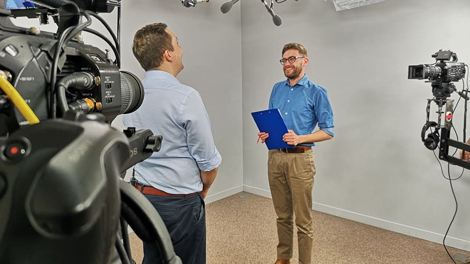 Studios For E-Learning Videos 5 Two men filming in a professional studio