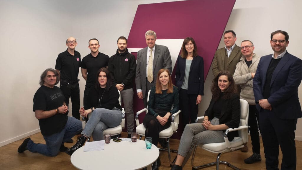 Live Streaming Manchester 6 A group of professionals gathered in office