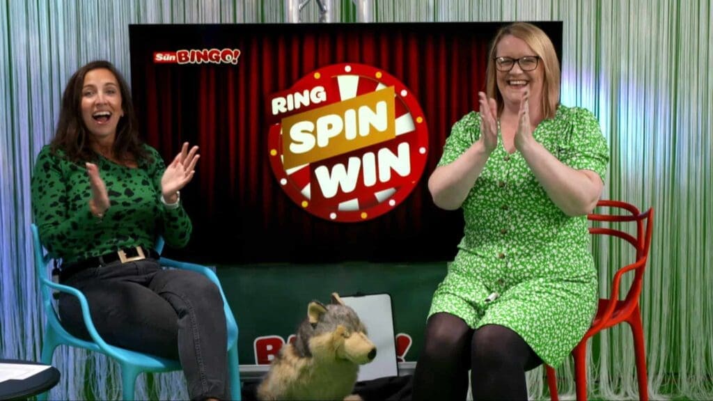 Award-Winning Studios in Manchester: Galleon Studios 13 People celebrating in a colourful game show Ring, Spin, Win.