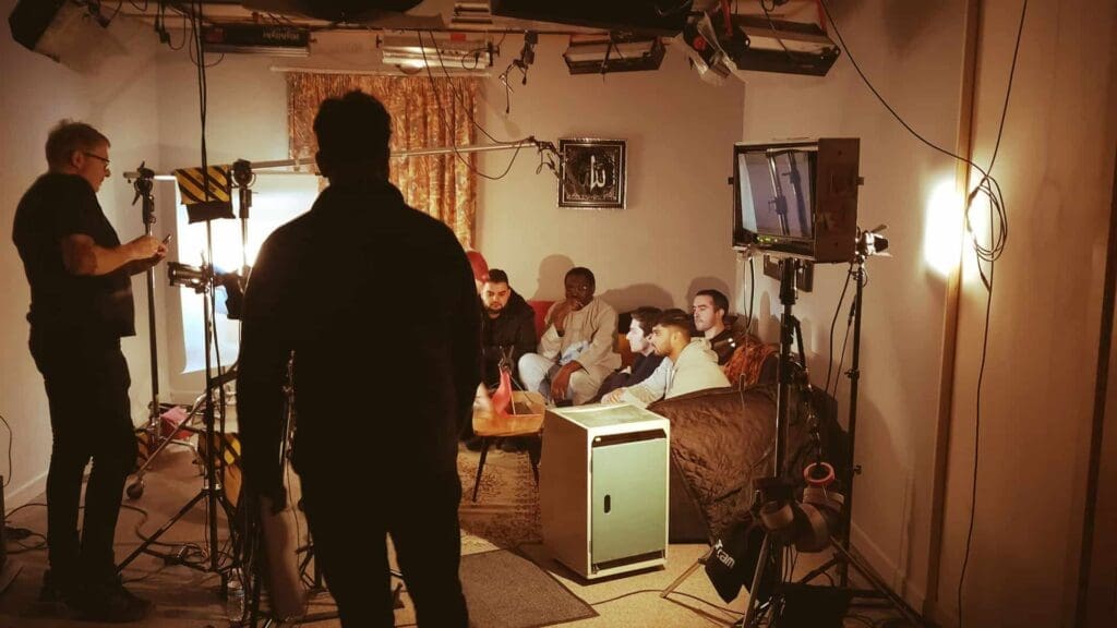 Film crew setting up interior scene shoot in Hush Studio.
