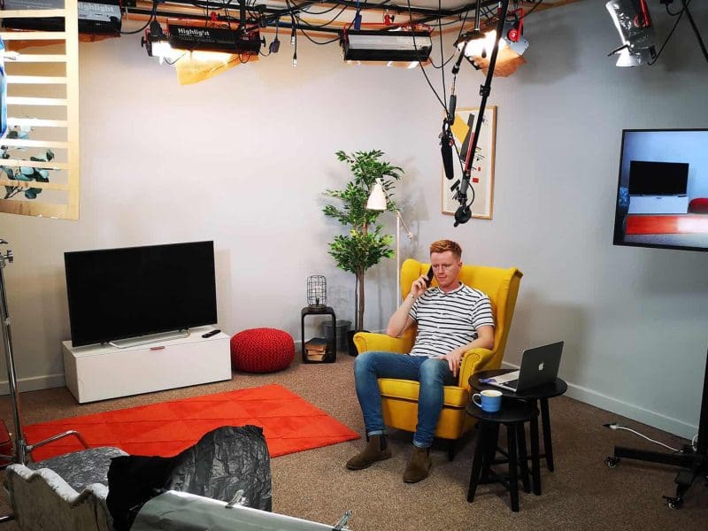 Person filmed in soundproof studio in Manchester
