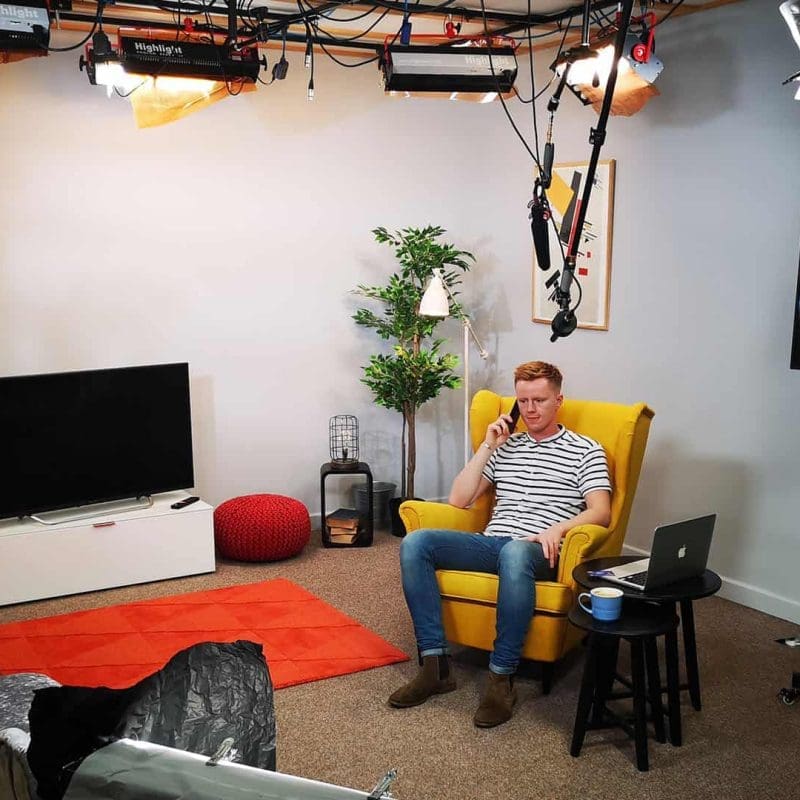 Person filmed in soundproof studio in Manchester