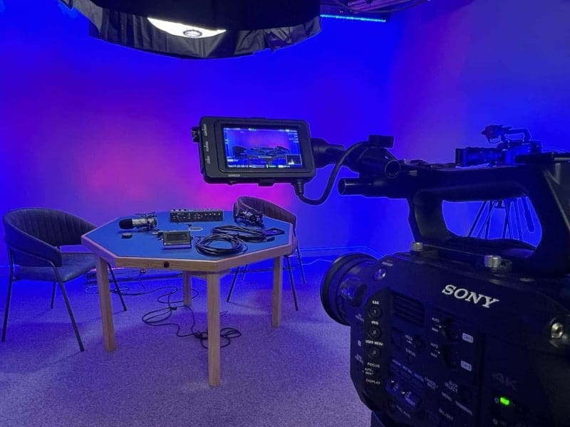 a podcast set up for filming in Hush Studio